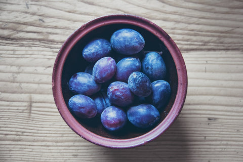 A bowl of purple Java Plums