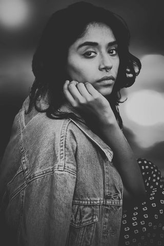 Black and white portrait of woman with a jacket 