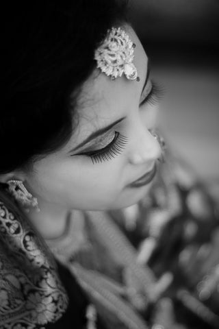 Close up of a woman in an Indian attire 