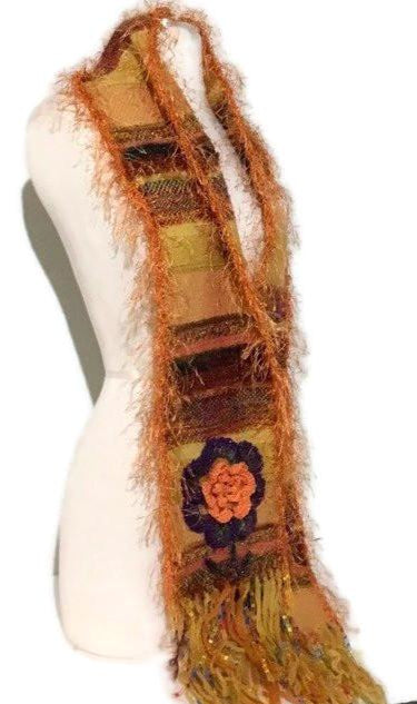 https://www.andreawagnerdesigns.com/collections/scarves/products/orange-alpaca-fiber-hand-woven-womans-size-neckwear-andrea-designs-handmade-scarves-the-orange-mum-scarf-winter-wrap-must-have-gift