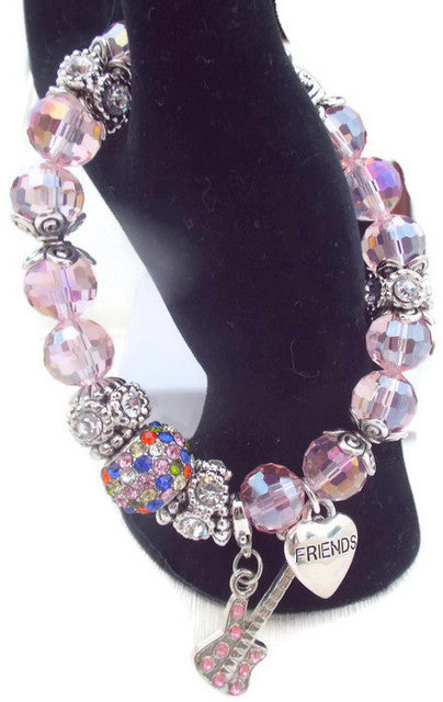 https://www.andreawagnerdesigns.com/products/beaded-bracelet-pink-rondelle-crystal-beads-with-rhinestones-boho-chic-stretch-bracelet-the-pink-bracelet