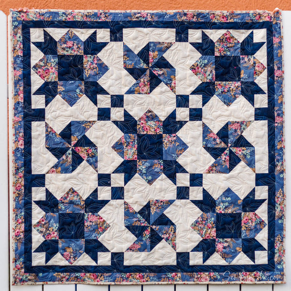 Weathervane 3-Yard Quilt patter in navy, cream, pink and various blues