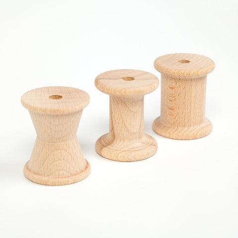 Grapat natural wooden reels in three different forms