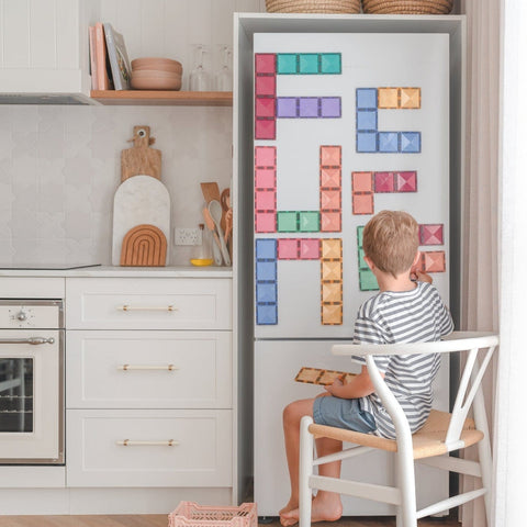 Connetix pastel rectangles ideas with magnetic tiles being used on fridge
