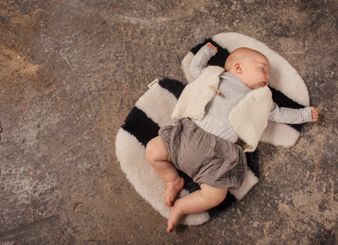 sheepskin buggy liner in grey and navy stripe, naturally thermostatic sheepskin will keep your baby toasty in winter and cool come summer