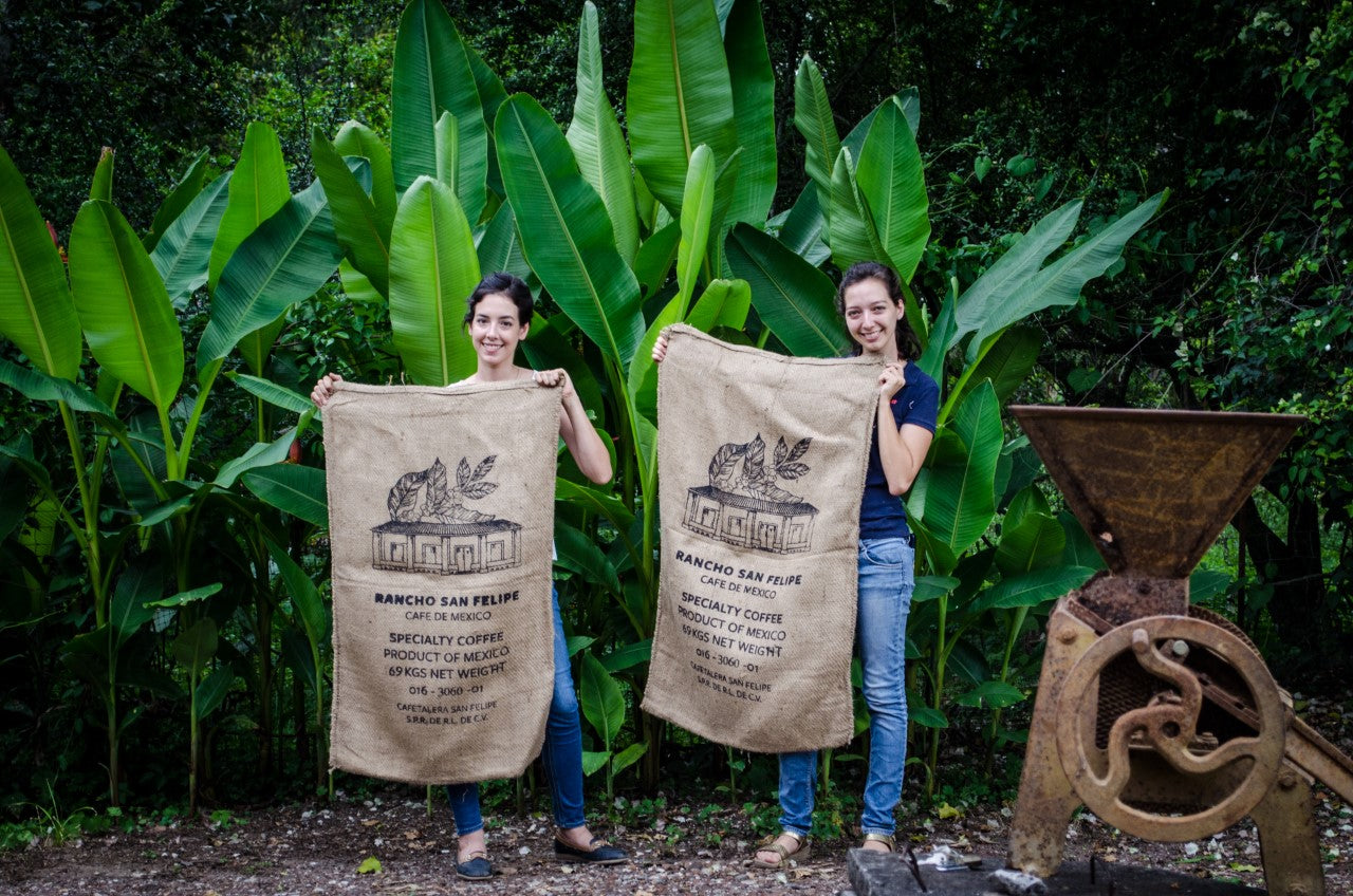 Melisa and Jimena de Gasperin with jute sacks from Cafe San Felipe.