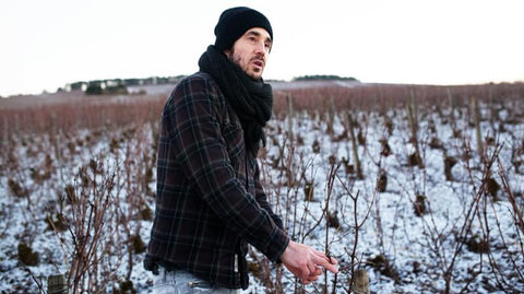 Picture of Cédric Bouchard in his snowy vineyards