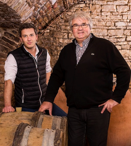 Champagne Gallimard Pere et Fils - Arnaud and his father in front of their barrels and amphorae in their cellars