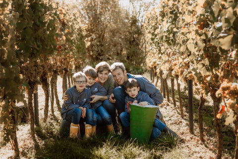 Picture of the Seehof family in their vineyard