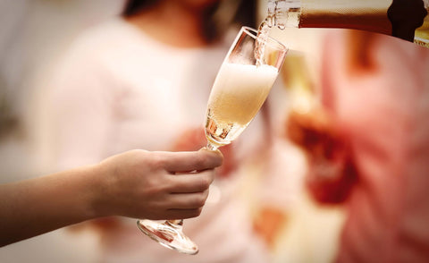 Sparkling wine being poured in a glass
