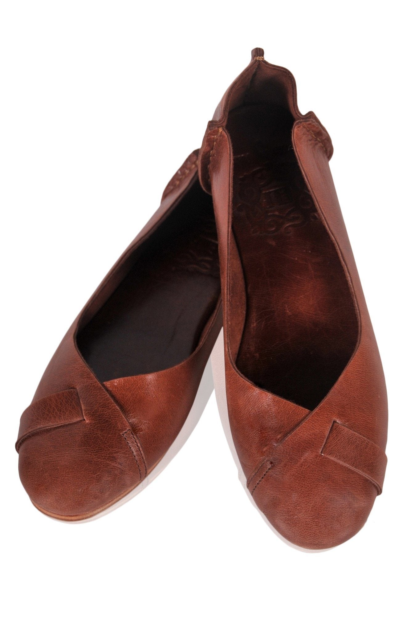 tan leather flat shoes