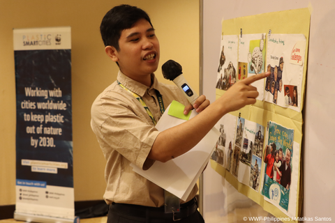 Charles Andaya, a student participant from Unibersidad de Manila, presents their team's storyboard prototype during PSC-TVA's Design Thinking Workshop.