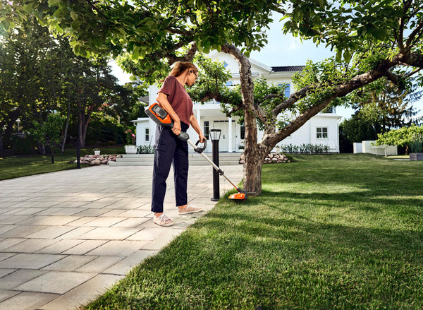 Husqvarna battery powered Line trimmer in action