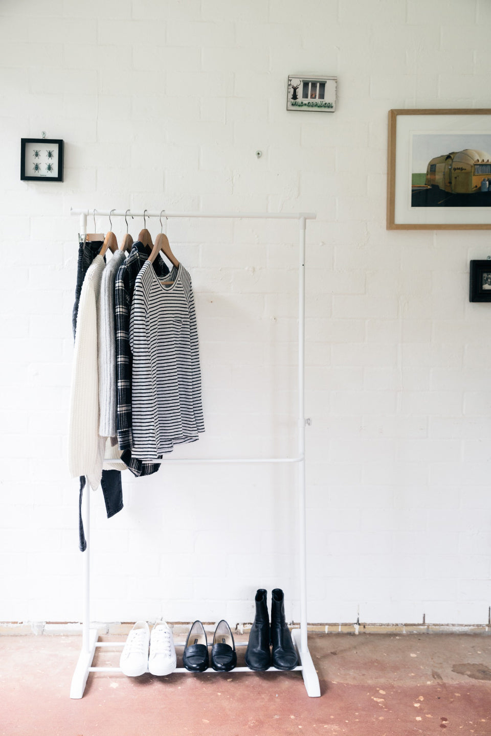 Clothes rack with capsule wardrobe