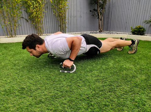 push-up handles being used for the push up exercise