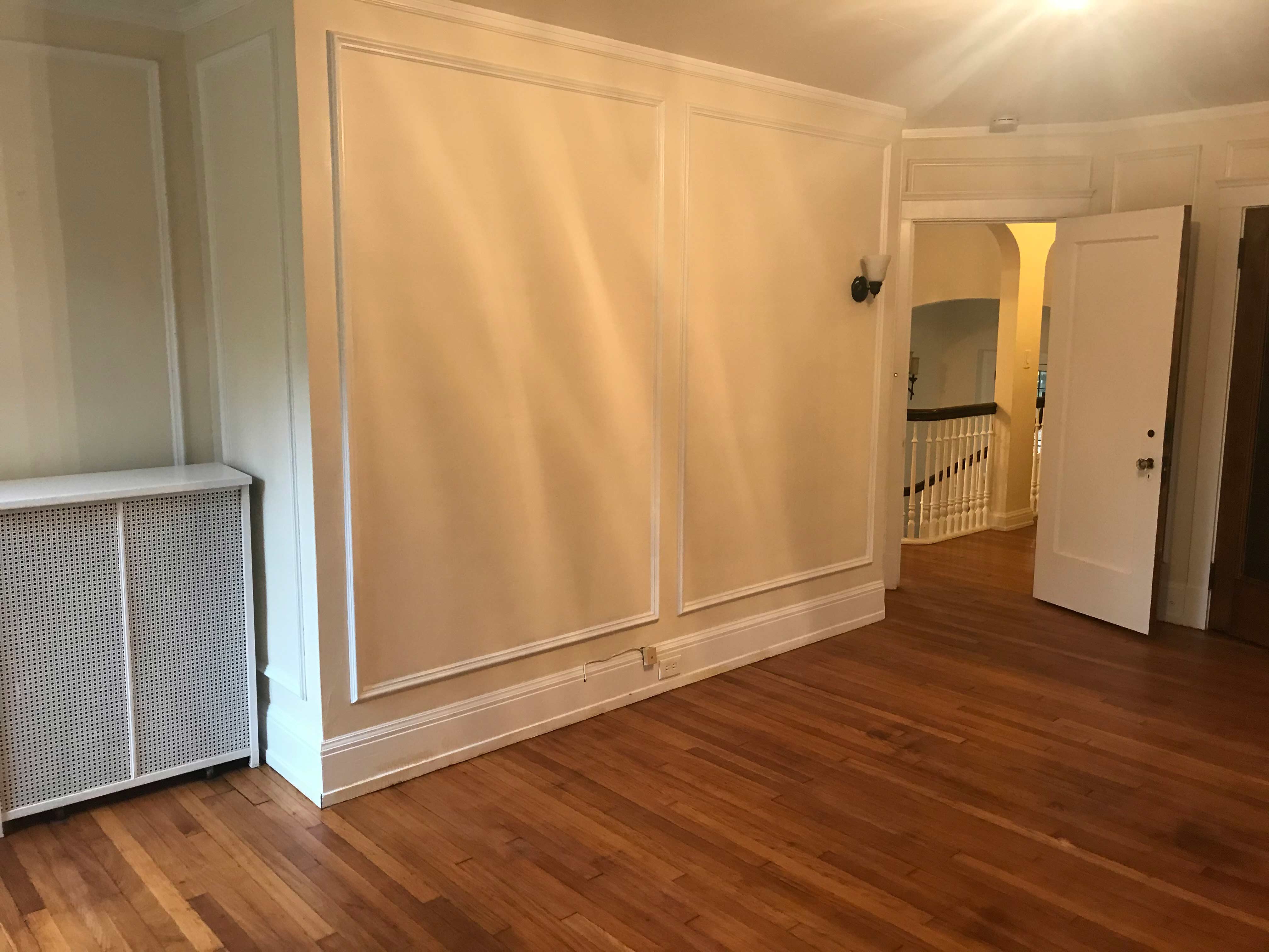 Before shot of master bedroom with bad light and the wrong wall colour.