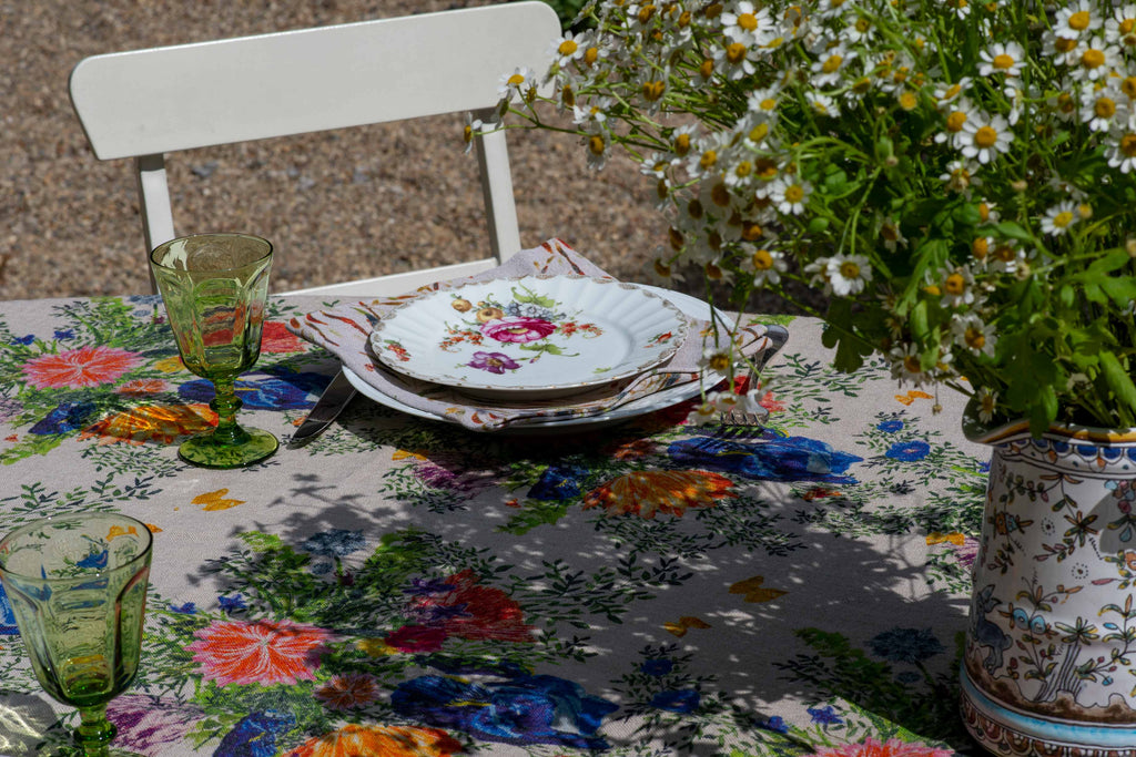Table setting with floral organic linen tablecloth and napkin