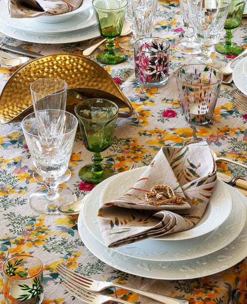 Yellow and gold table scape with organic linen tablecloth and napkins
