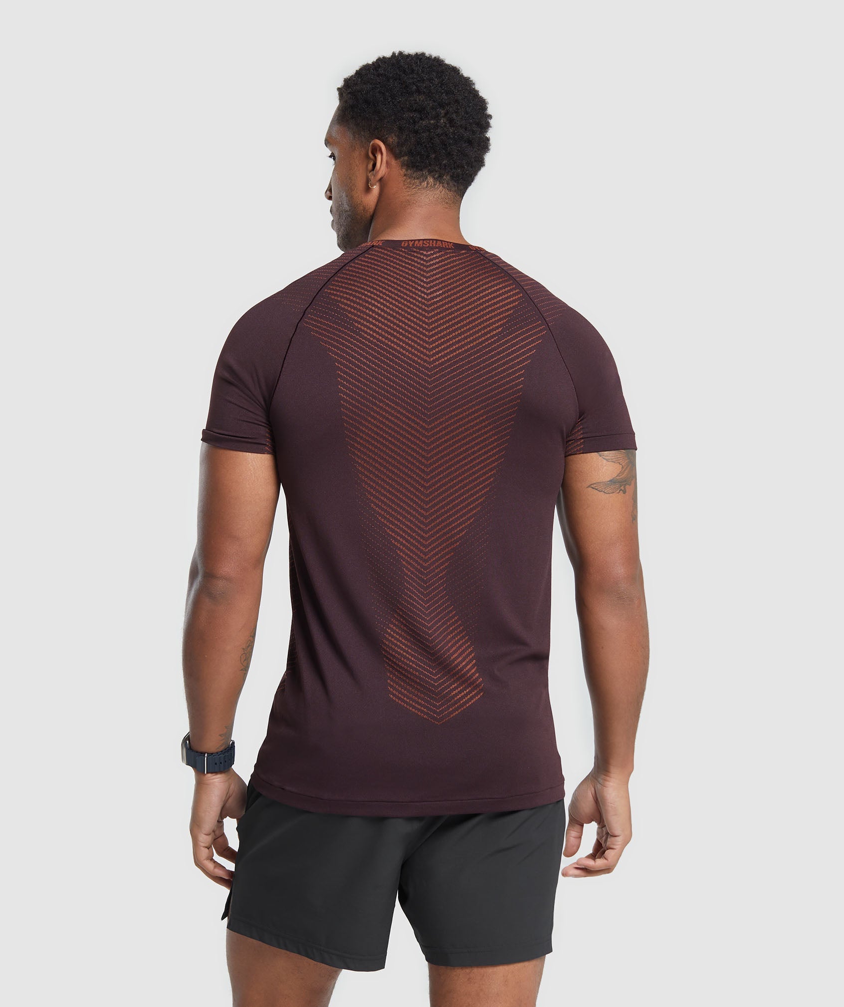 Apex Seamless T-Shirt in Plum Brown/Rust Orange - view 2