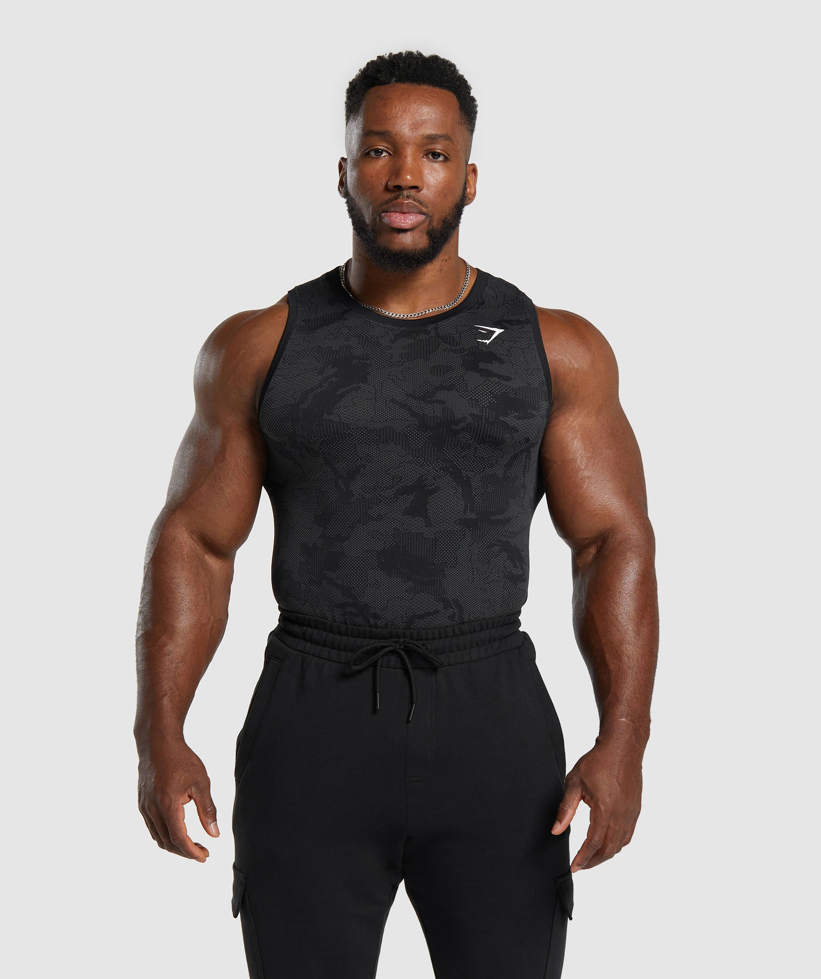 MEN'S MIDWEIGHT SEAMLESS COMPRESSION SLEEVELESS TOP, BLACK