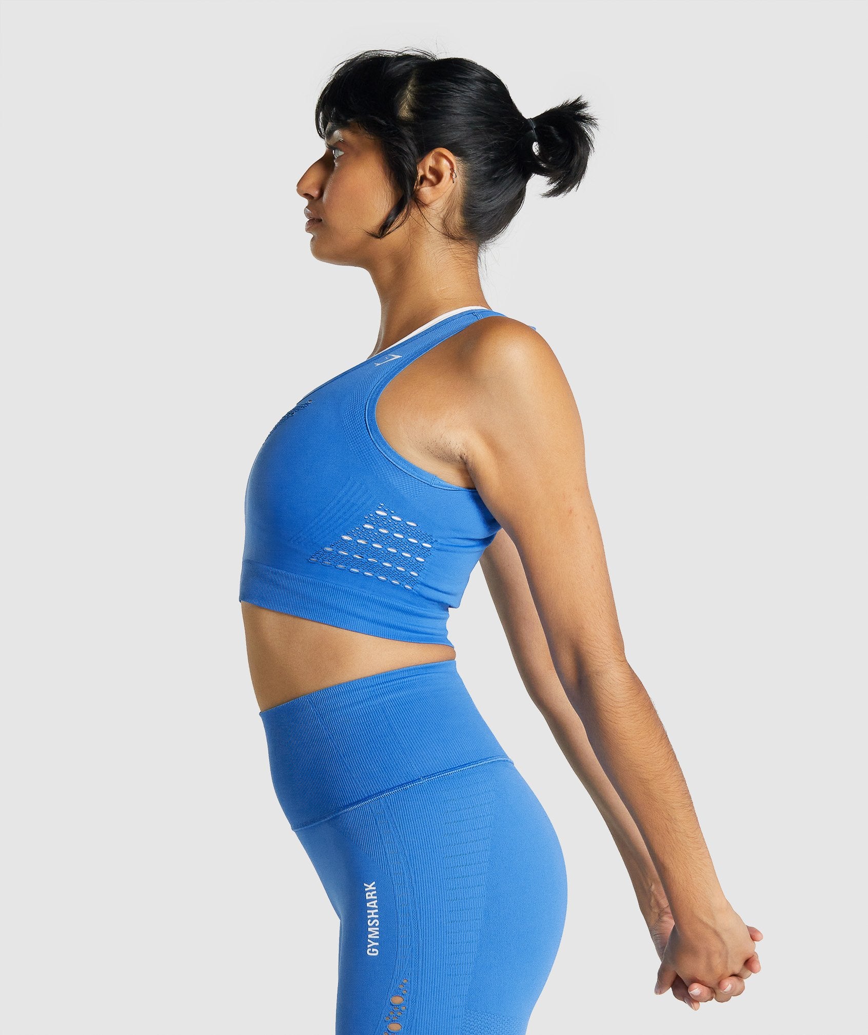 Gymshark model wearing the Energy+ Seamless in Indigo. Power up and  increase the effort for your work…