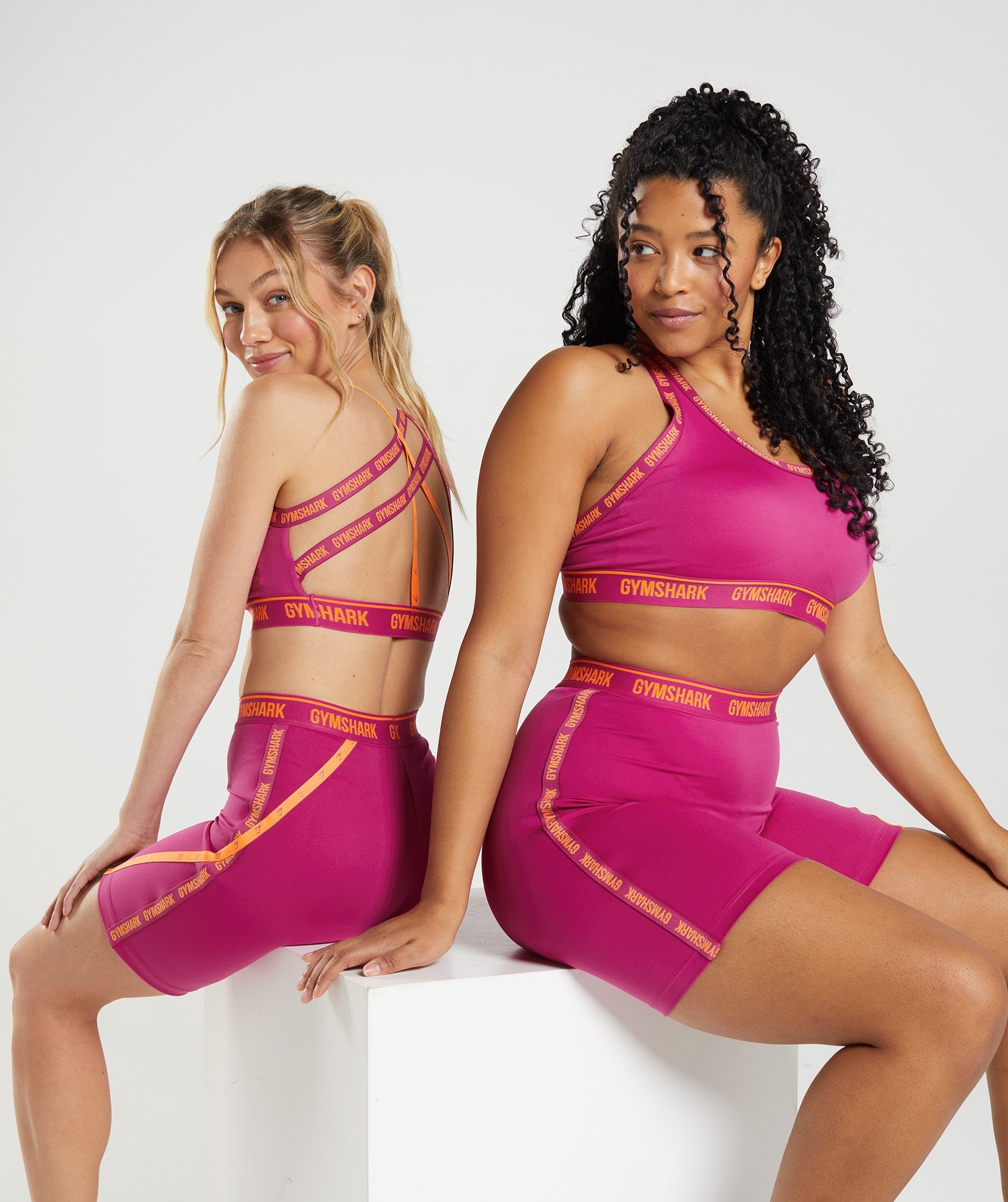 Strike Sports Bra in Dragon Pink/Horizon Orange - view 4