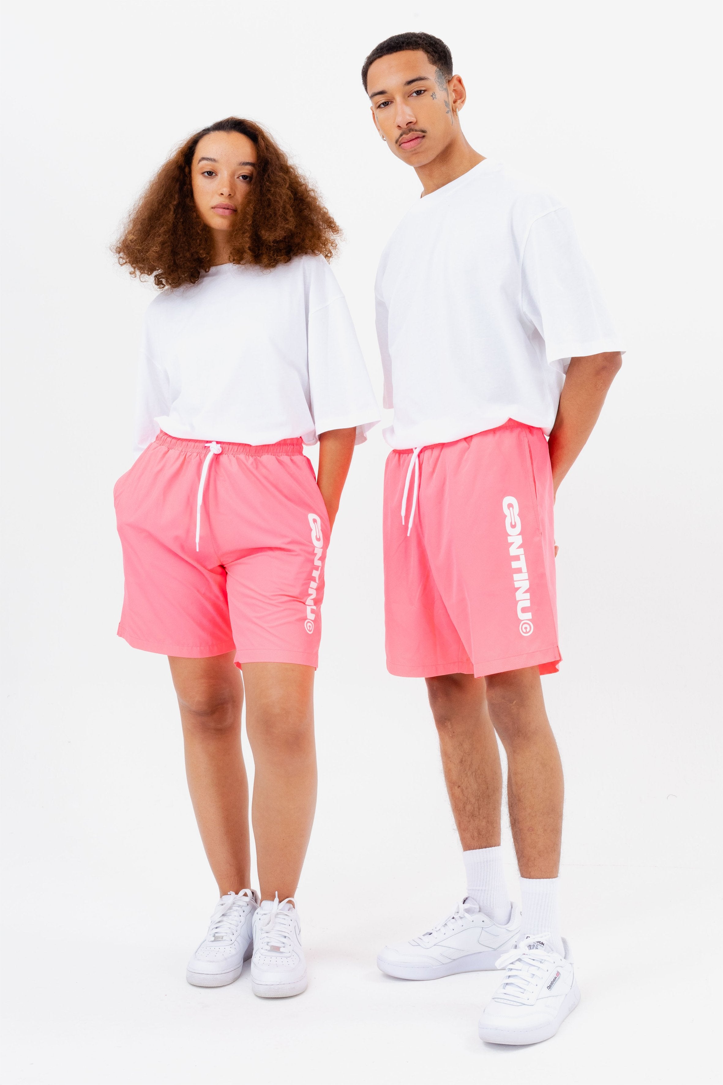 continu8 pink swim shorts