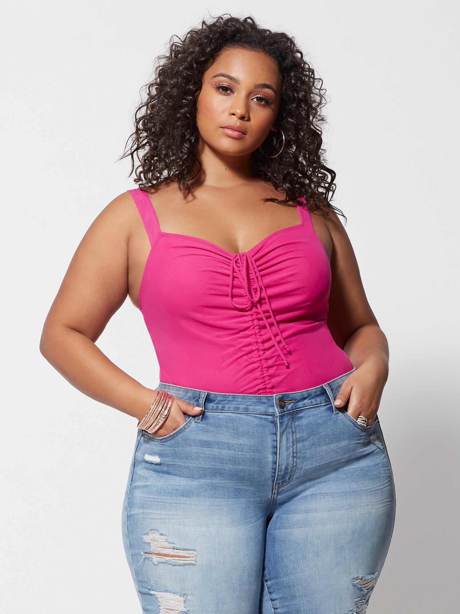 dark pink top with jeans