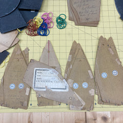 Segment flat cap pattern pieces on the cutting table