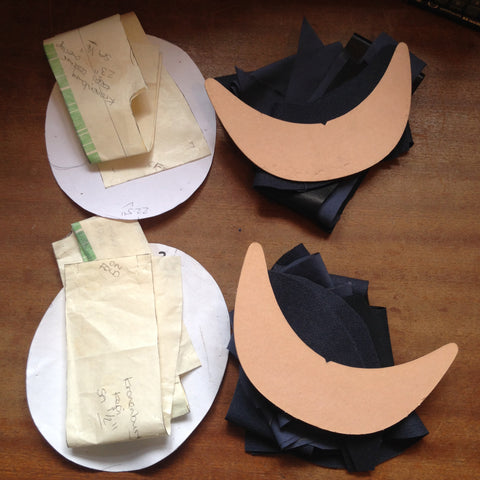 Flat lay images of pattern pieces ready to sew into kepi caps