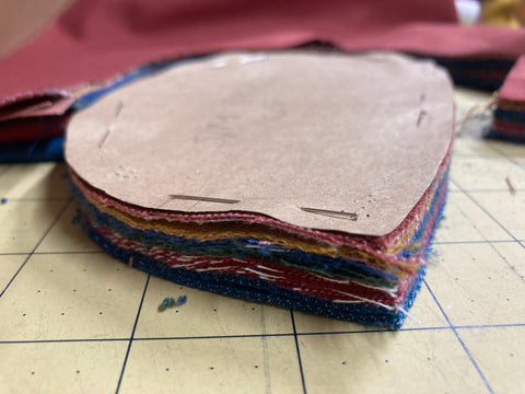 Side view of fabric pieces cut to make panel caps