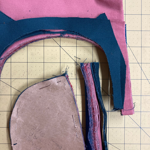 Fabric layers cut out by an electric rotary cutter