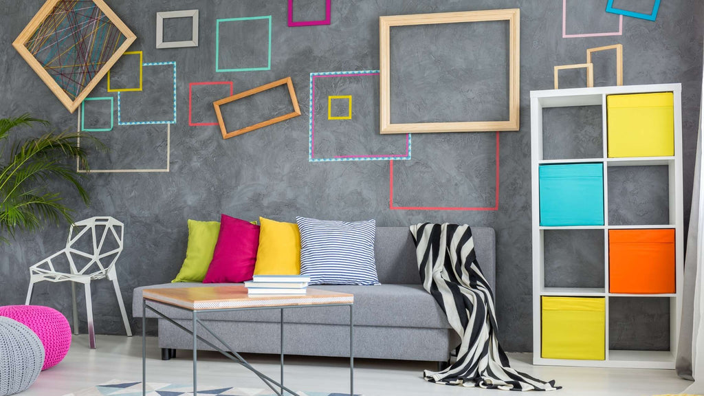 A gray room with some colorful frames and squares