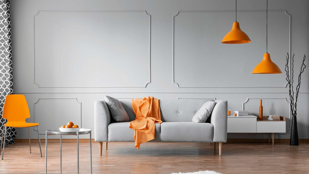 A gray room with orange features