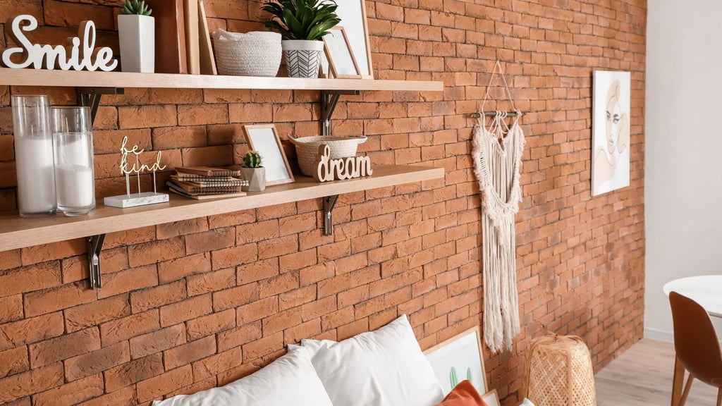 Shelves on a brick wall. 