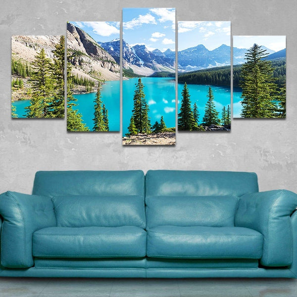 A canvas print of Moraine Lake in Banff National Park. There are trees, mountains, and a beautiful lake.