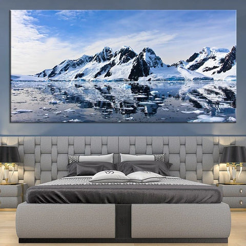 landscape wall art above the bed