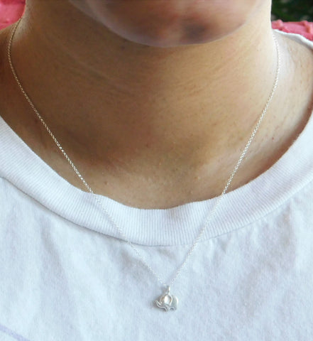 Elefootprints sterling silver baby elephant necklace with diamond eye_around the neck