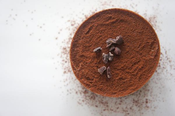 cacao powder with chocolate pieces top view