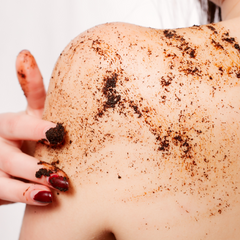 Woman Rubbing Body Scrub on Her Back