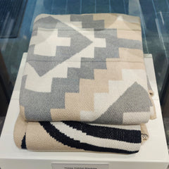 Happy Habitat throws on display in Museum Store