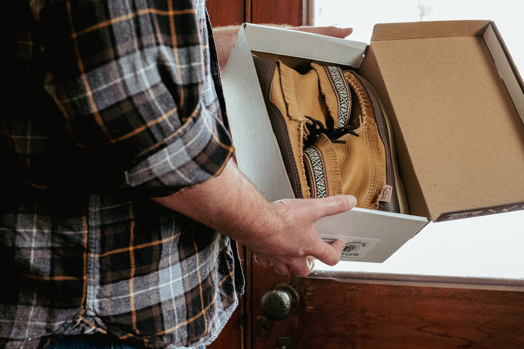 unboxing a pair of Laurentian Chief moccasins made in Canada
