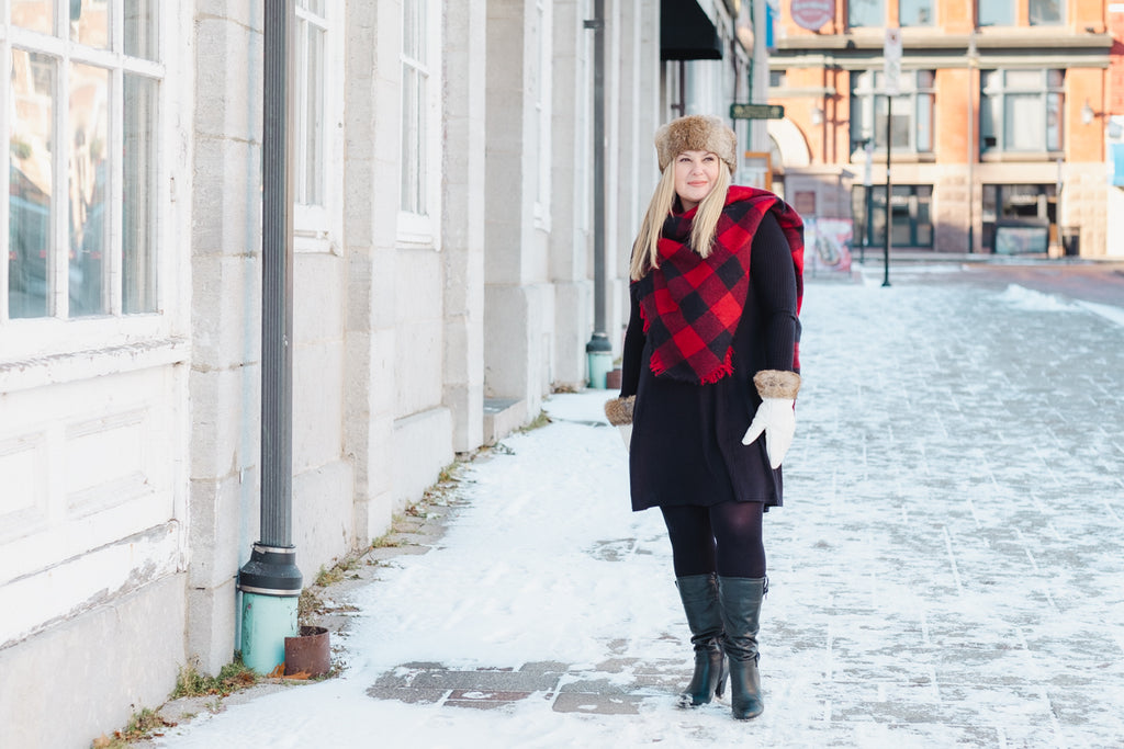 downtown kingston ontario in the winter with woman with fashionable outfit
