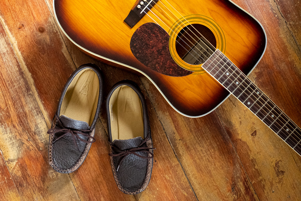 Guitar with moccasins