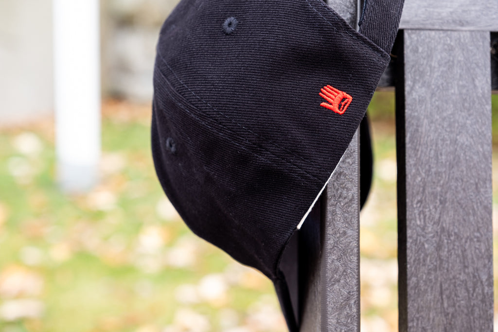 Native Northwest emblem logo icon embroidered on the side of a hat