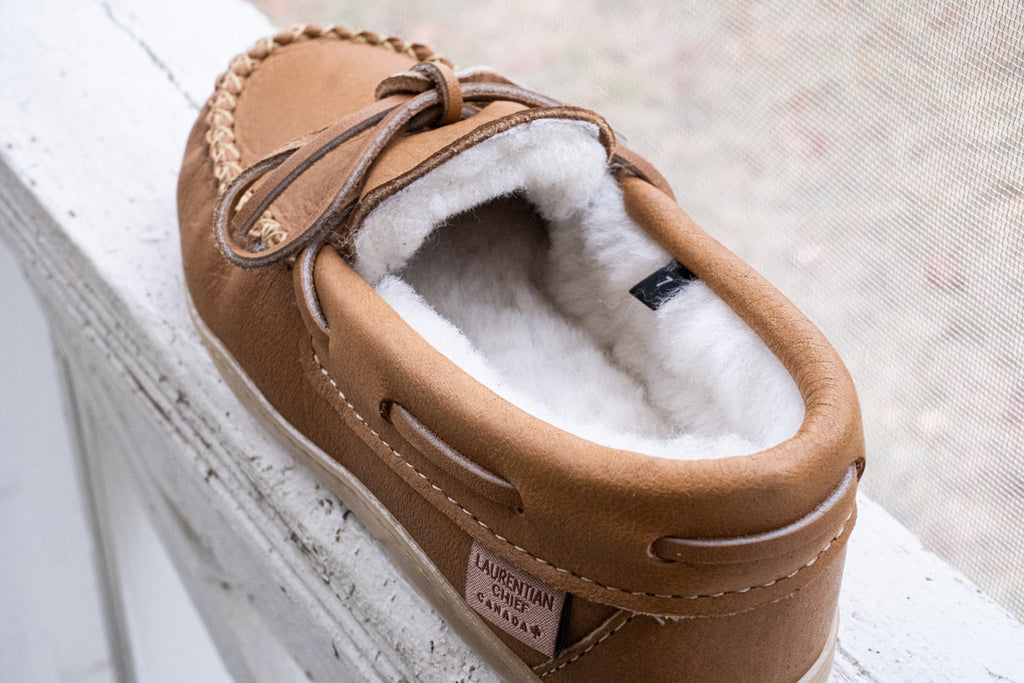 luxurious pair of sheepskin- lined leather moccasins