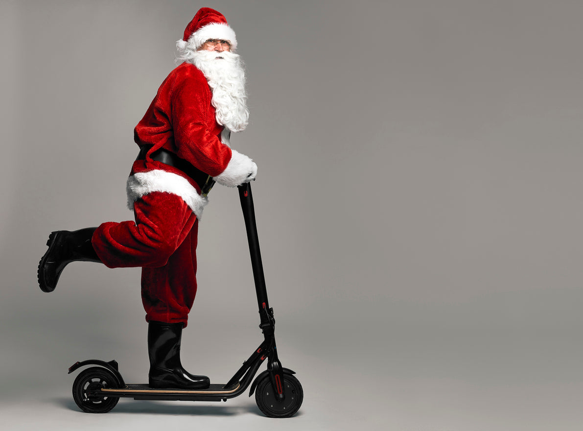 santa clause on e-scooter