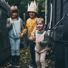 3 kids wearing cub and pudding dungarees