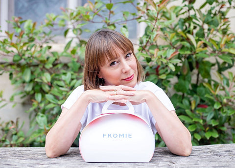 Nicky Bragg founder of Fromie Gift leaning on the iconic Fromie Gift Box