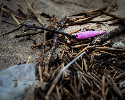 Plastic tampon applicator washed up on beach